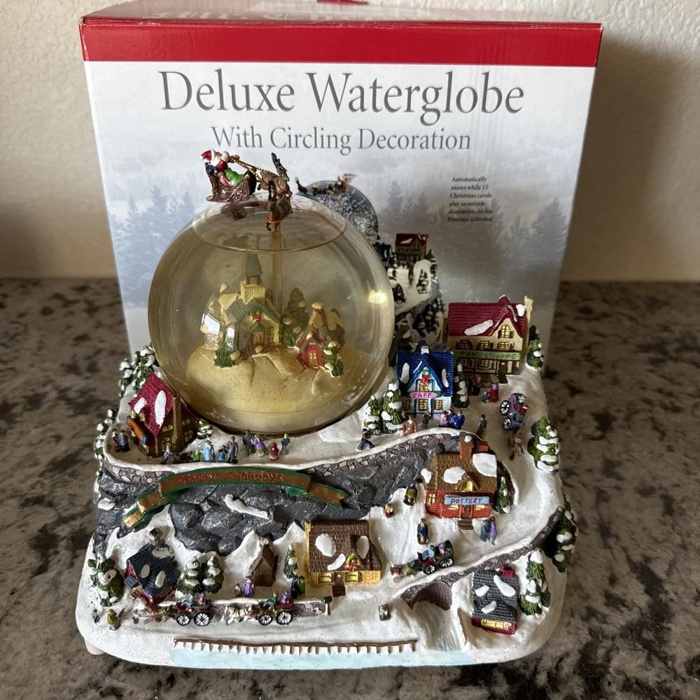 Mr Christmas Holiday Snow Globe Musical Water Globe With Circling Decoration.